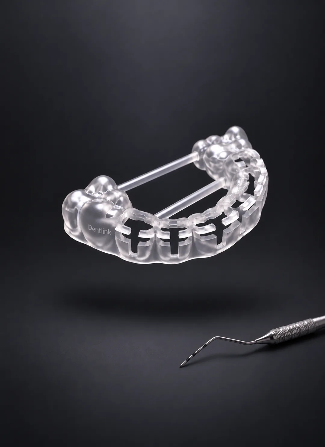 A Dentlink prep guide seated on a model, a window over each tooth showing exactly where the bur stops